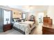A cozy bedroom featuring gray wood flooring, a ceiling fan, and neutral colored walls at 137 Salem Creek Dr, Goose Creek, SC 29445