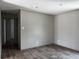Bright bedroom featuring modern floors, neutral colored walls, recessed lighting, and hardwood floors that offer style and comfort at 1420 Rehoboth Rd, Cottageville, SC 29435