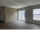 Well lit living room featuring modern floors, recessed lights, sliding glass door that leads to the outside at 1420 Rehoboth Rd, Cottageville, SC 29435