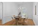 Dining area features a round table, stylish chairs, chandelier, and plenty of natural light at 1441 Waterside Ct, Mount Pleasant, SC 29464