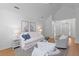 Bright living room featuring vaulted ceilings, hardwood floors, and stylish neutral decor at 1441 Waterside Ct, Mount Pleasant, SC 29464