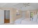 Spacious main bedroom with tray ceilings, neutral tones, and en-suite bathroom access at 1441 Waterside Ct, Mount Pleasant, SC 29464