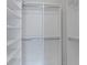 Spacious white walk-in closet with ample shelving and rod space for organized storage at 1441 Waterside Ct, Mount Pleasant, SC 29464