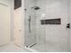 Luxurious bathroom shower featuring beautiful marble and modern fixtures at 145 Pier View St # 111, Charleston, SC 29492