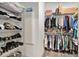 Spacious walk-in closet provides ample storage with shelving and hanging space at 145 Pier View St # 111, Charleston, SC 29492