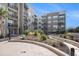 Apartment complex featuring well-maintained landscaping, multiple balconies, and modern architectural design at 145 Pier View St # 111, Charleston, SC 29492