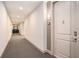 Hallway featuring a carpeted floor, a neutral color scheme, and a view to the end at 145 Pier View St # 111, Charleston, SC 29492