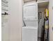 Laundry closet featuring a stackable washer and dryer, with room for supplies at 145 Pier View St # 111, Charleston, SC 29492