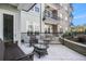 Comfortable condo patio area with wicker furniture, great for relaxing outdoors at 145 Pier View St # 111, Charleston, SC 29492