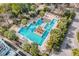 Inviting geometric pool surrounded by lush landscaping and lounge chairs, perfect for relaxing and enjoying the outdoor space at 145 Pier View St # 111, Charleston, SC 29492