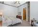 Modern bedroom with carpet, a ceiling fan, and a decorative dresser for a relaxing atmosphere at 150 Bee St # 308, Charleston, SC 29401