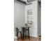 Cozy dining area features a small table and built-in shelving at 150 Bee St # 308, Charleston, SC 29401