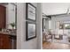 Open-concept living room with dining area and view of an outdoor patio through large sliding glass doors at 150 Bee St # 308, Charleston, SC 29401