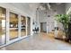 Spacious lobby with tile flooring and glass doors, offering a bright and modern entrance at 150 Bee St # 308, Charleston, SC 29401