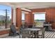 Outdoor patio featuring a grill, seating, and beautiful brickwork, offering a comfortable place to unwind at 150 Bee St # 308, Charleston, SC 29401