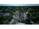 Scenic aerial view of a waterfront neighborhood near marsh lands, complemented by mature trees at 1551 Ben Sawyer Blvd # 4D, Mount Pleasant, SC 29464