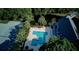 A stunning aerial view highlights the pool and tennis court amenities, perfect for an active lifestyle at 1551 Ben Sawyer Blvd # 4D, Mount Pleasant, SC 29464