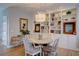 Inviting dining space featuring built-in cabinets and shelving, ideal for entertaining at 1551 Ben Sawyer Blvd # 4D, Mount Pleasant, SC 29464