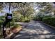 Community entrance featuring an automated gate system, ensuring privacy and security for residents at 1551 Ben Sawyer Blvd # 4D, Mount Pleasant, SC 29464