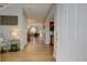 Inviting entryway with hardwood floors and an open view of the living spaces at 1551 Ben Sawyer Blvd # 4D, Mount Pleasant, SC 29464