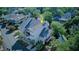 Multi-level home featuring covered balconies and complemented by mature trees, set in a lush, green neighborhood at 1551 Ben Sawyer Blvd # 4D, Mount Pleasant, SC 29464