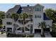 Beautiful three-story beach home featuring multiple decks and covered parking at 1551 Ben Sawyer Blvd # 4D, Mount Pleasant, SC 29464