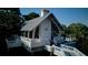 A close aerial view showcases the elegant structure with its covered areas, complemented by serene waters at 1551 Ben Sawyer Blvd # 4D, Mount Pleasant, SC 29464