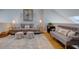 Cozy living room with two sofas, ottoman poufs, a soft rug, and tasteful decor creates a relaxing atmosphere at 1551 Ben Sawyer Blvd # 4D, Mount Pleasant, SC 29464