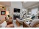 Cozy living room with a fireplace, built-in shelving, and comfortable seating at 1551 Ben Sawyer Blvd # 4D, Mount Pleasant, SC 29464