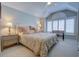 Bedroom with a large window, a cozy reading nook, and a decorative bed at 1551 Ben Sawyer Blvd # 4D, Mount Pleasant, SC 29464