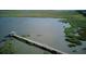 Marsh landscape featuring a long pier leading to a gazebo, with lush vegetation surrounding the waterway at 1551 Ben Sawyer Blvd # 4D, Mount Pleasant, SC 29464