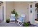 Cozy front porch with comfortable seating and charming decor at 1551 Ben Sawyer Blvd # 4D, Mount Pleasant, SC 29464