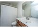 Bathroom features a white vanity, neutral walls, toilet, shower/tub combination with curtain at 1607 Roustabout Way, Charleston, SC 29414