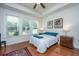 Bright bedroom with natural light, wood floors, and tasteful decor, creating a cozy and inviting space at 1607 Roustabout Way, Charleston, SC 29414
