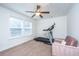 Bonus room featuring a treadmill, chair, ceiling fan, and neutral carpet at 1607 Roustabout Way, Charleston, SC 29414
