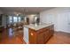 Kitchen island with bar seating, seamlessly connecting to the living and dining spaces for modern living at 1607 Roustabout Way, Charleston, SC 29414