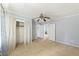 Light-filled bedroom with wood floors, neutral walls, and a ceiling fan at 1736 Central Ave, Summerville, SC 29483