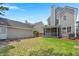 The expansive backyard features lush green grass, a screened-in porch, and a charming wooden fence at 1844 Hubbell Dr, Mount Pleasant, SC 29466