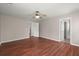 Spacious bedroom with ceiling fan, wood-look floors, and ensuite bathroom at 1844 Hubbell Dr, Mount Pleasant, SC 29466