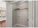 Open closet with white shelving and views to backyard at 1844 Hubbell Dr, Mount Pleasant, SC 29466