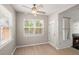 Cozy eat-in dining area with large windows and ample natural light adjacent to the living area at 1844 Hubbell Dr, Mount Pleasant, SC 29466