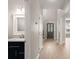 Light-filled hallway showcasing modern fixtures, neutral walls, and stylish vinyl floors at 1844 Hubbell Dr, Mount Pleasant, SC 29466