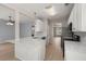 The well-equipped kitchen features stainless appliances, stone counter tops, and a breakfast bar at 1844 Hubbell Dr, Mount Pleasant, SC 29466