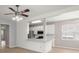 The kitchen features white cabinets, stainless steel appliances, and modern pendant lighting at 1844 Hubbell Dr, Mount Pleasant, SC 29466