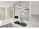 The kitchen boasts stone counters and backsplash, stainless appliances, and modern fixtures at 1844 Hubbell Dr, Mount Pleasant, SC 29466