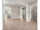 Open-concept living room featuring a neutral color palette, vinyl floors and bright natural light at 1844 Hubbell Dr, Mount Pleasant, SC 29466
