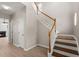 Beautiful wooden staircase with white railings leading to the second floor at 1844 Hubbell Dr, Mount Pleasant, SC 29466