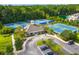 Aerial view of a tennis center with multiple tennis courts and a clubhouse with parking at 1844 Hubbell Dr, Mount Pleasant, SC 29466