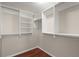 Spacious walk-in closet with custom white shelving and ample hanging space, perfect for organization at 1844 Hubbell Dr, Mount Pleasant, SC 29466