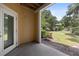 Covered patio offering serene views of the lush green landscape at 1915 Chatelain Way, Mount Pleasant, SC 29464
